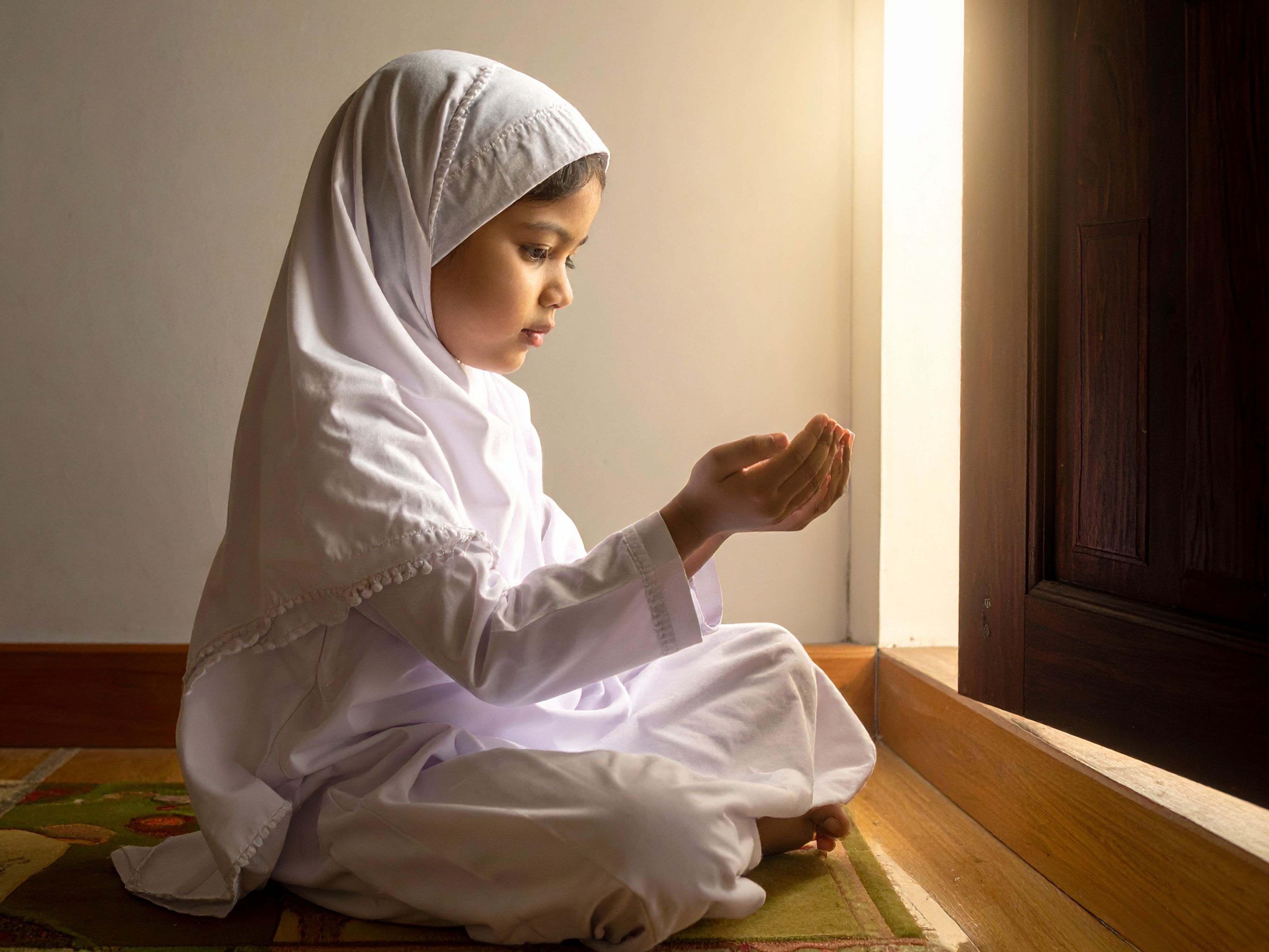 young-muslim-girl-prayer-with-hands-open.jpg